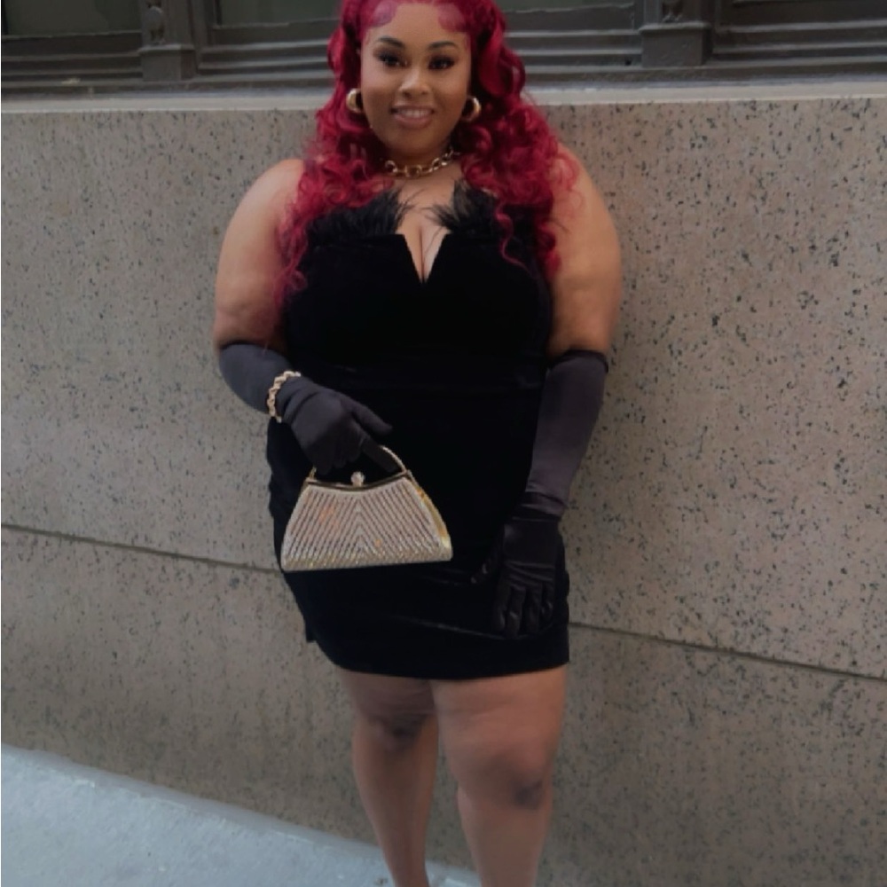 Black Dress with Red Hair and Silver Purse